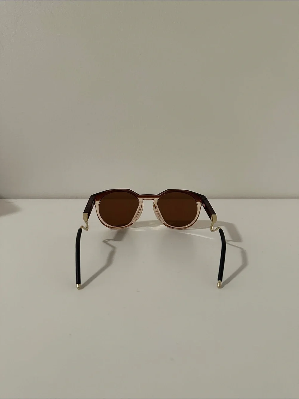Oakley Men’s Brown Lensed Sunglasses with Gold Temple Accents